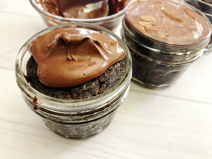 add melted chocolate to peanut butter cup cupcakes