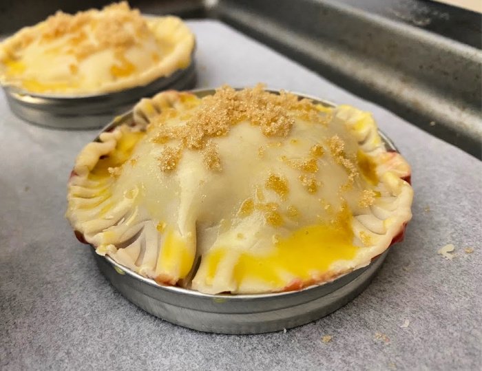 sprinkle brown sugar on Mason jar lid pies