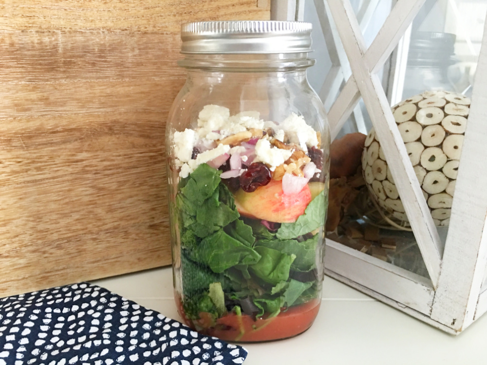 This Apple Harvest Mason Jar Salad is delicious with a little sweetness from the cherries and apples. 