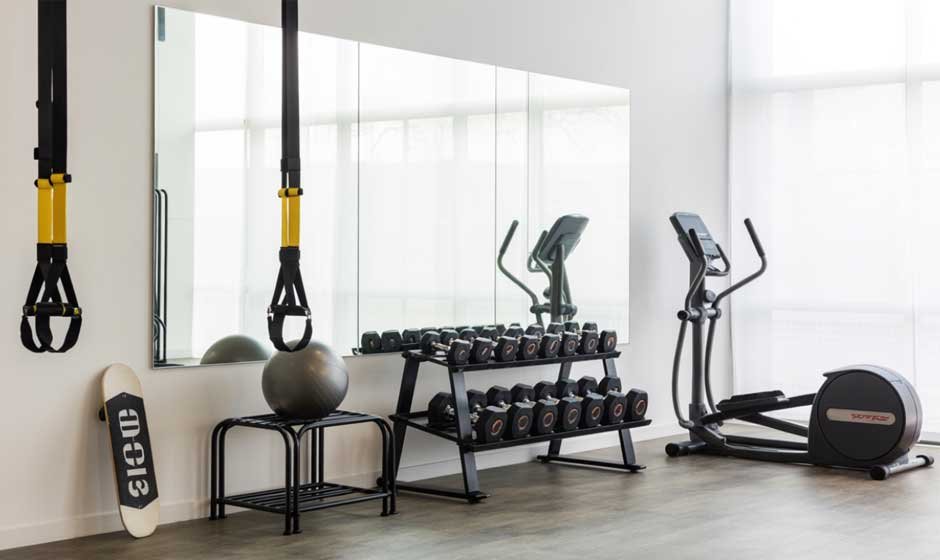 Enhancing Workout Spaces with Wall Fitness Center Mirrors